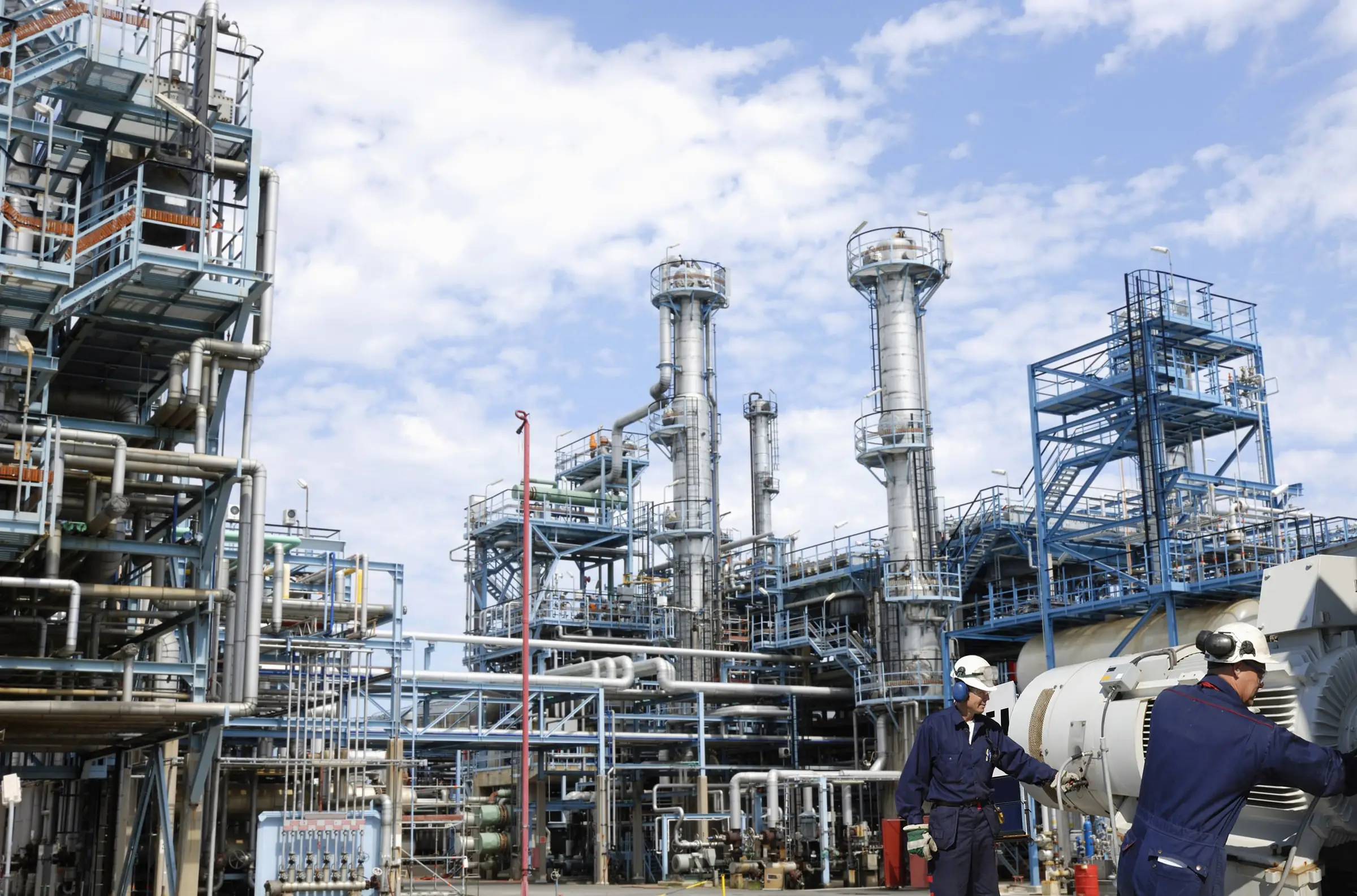 Technicians at an industrial plant
